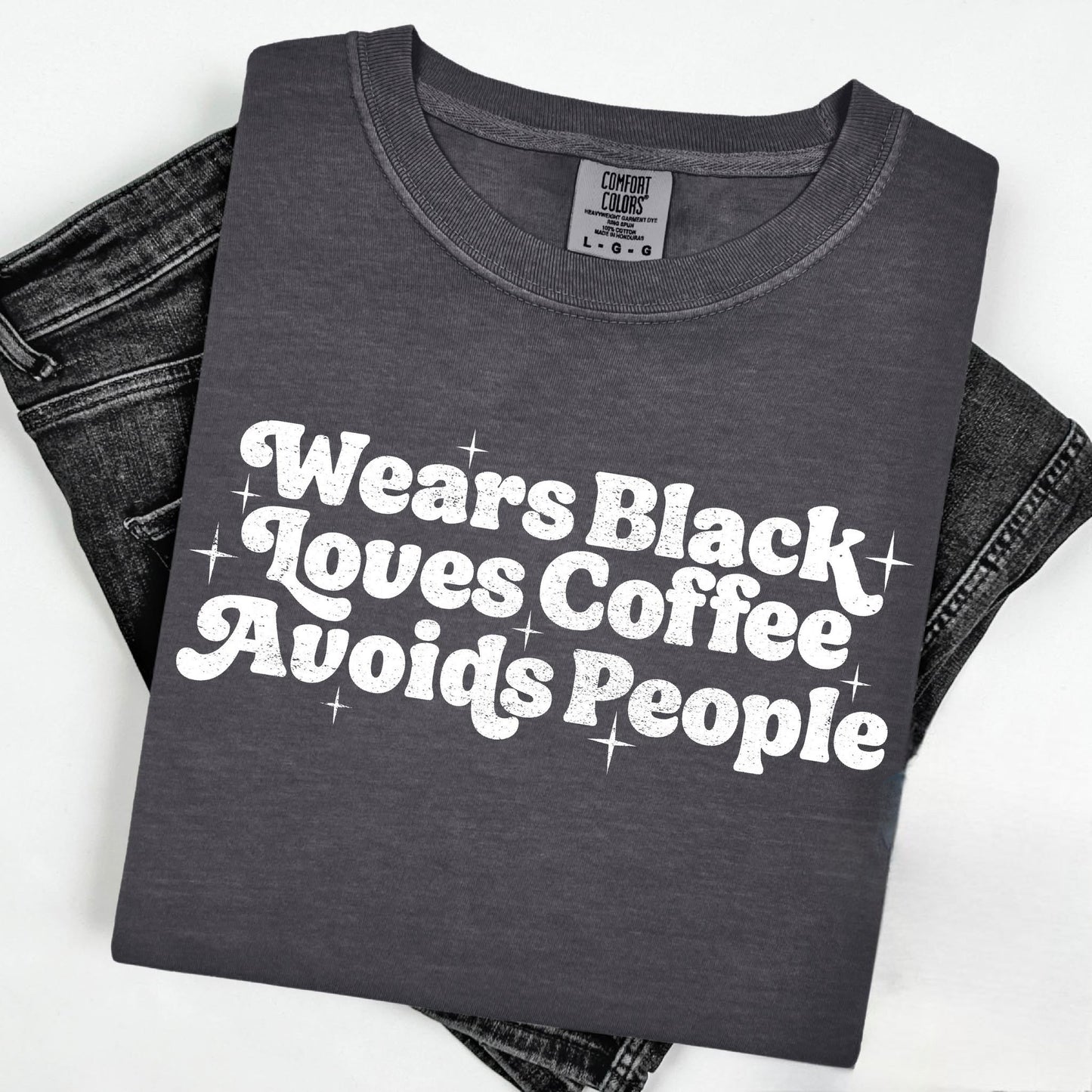 Wears Black Graphic Shirt